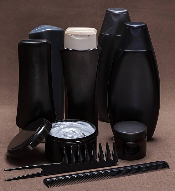 A selection of top-rated hair products for men including pomade, gel, and styling cream.