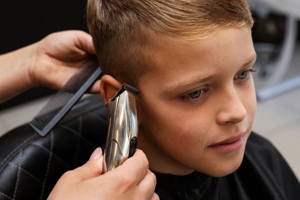 Young boy with a clean and age-appropriate haircut.